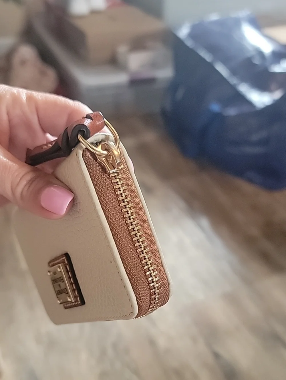 Dooney & Bourke  Pebbled Leather Zip-Around Wallet In Bone